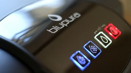 blupura Tafelwasseranlage HOT Steuerung mit beleuchteten Symbolen für verschiedene Wasservarianten.